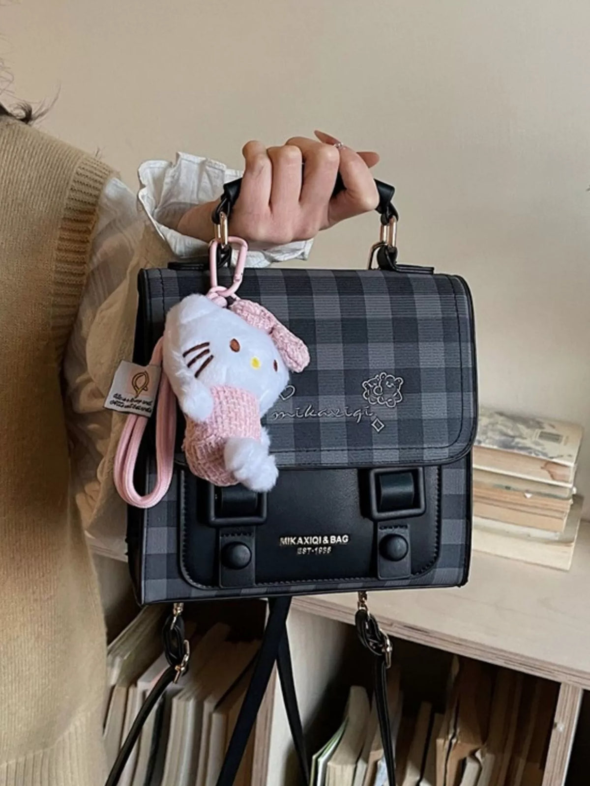 Black plaid embroidered flap mini backpack back view