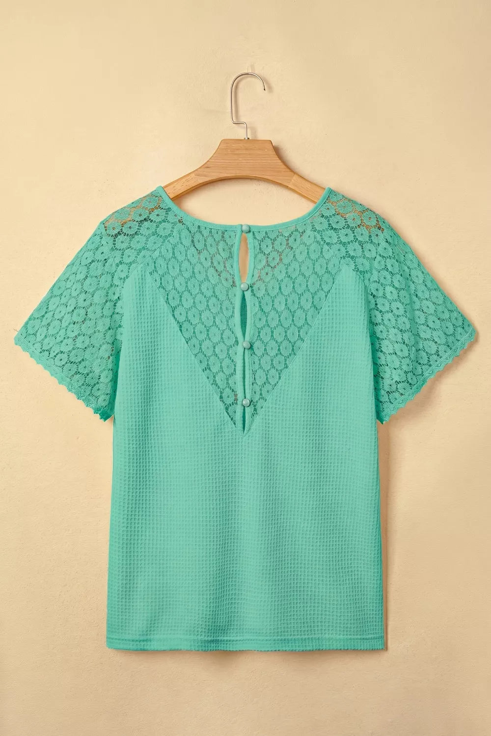 Turquoise waffle knit v neck top with lace trim front view
