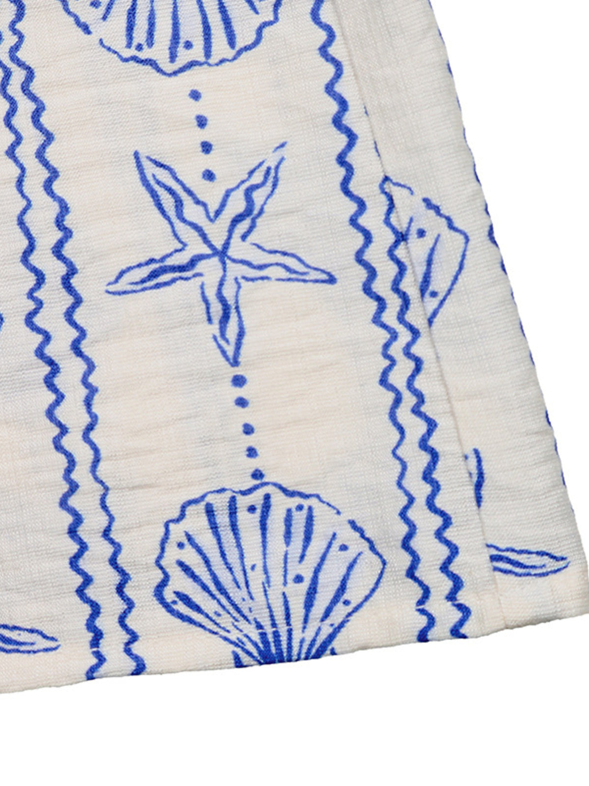 Seashell print fabric and drape detail