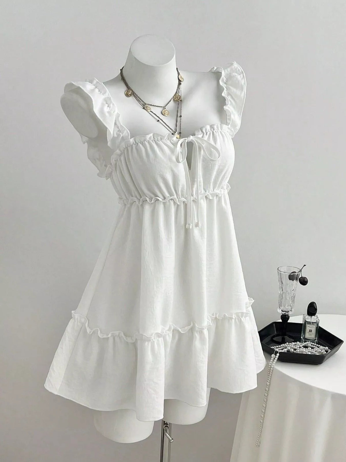 Side view showing the ruched body of the dress