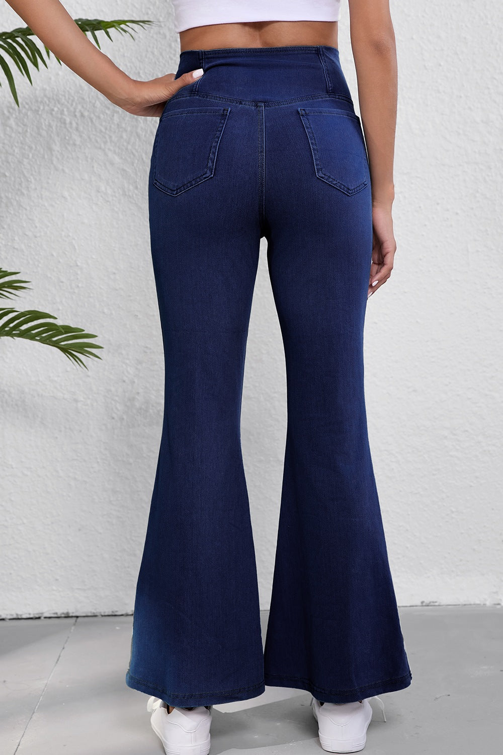 Close up of denim wash on flare jeans