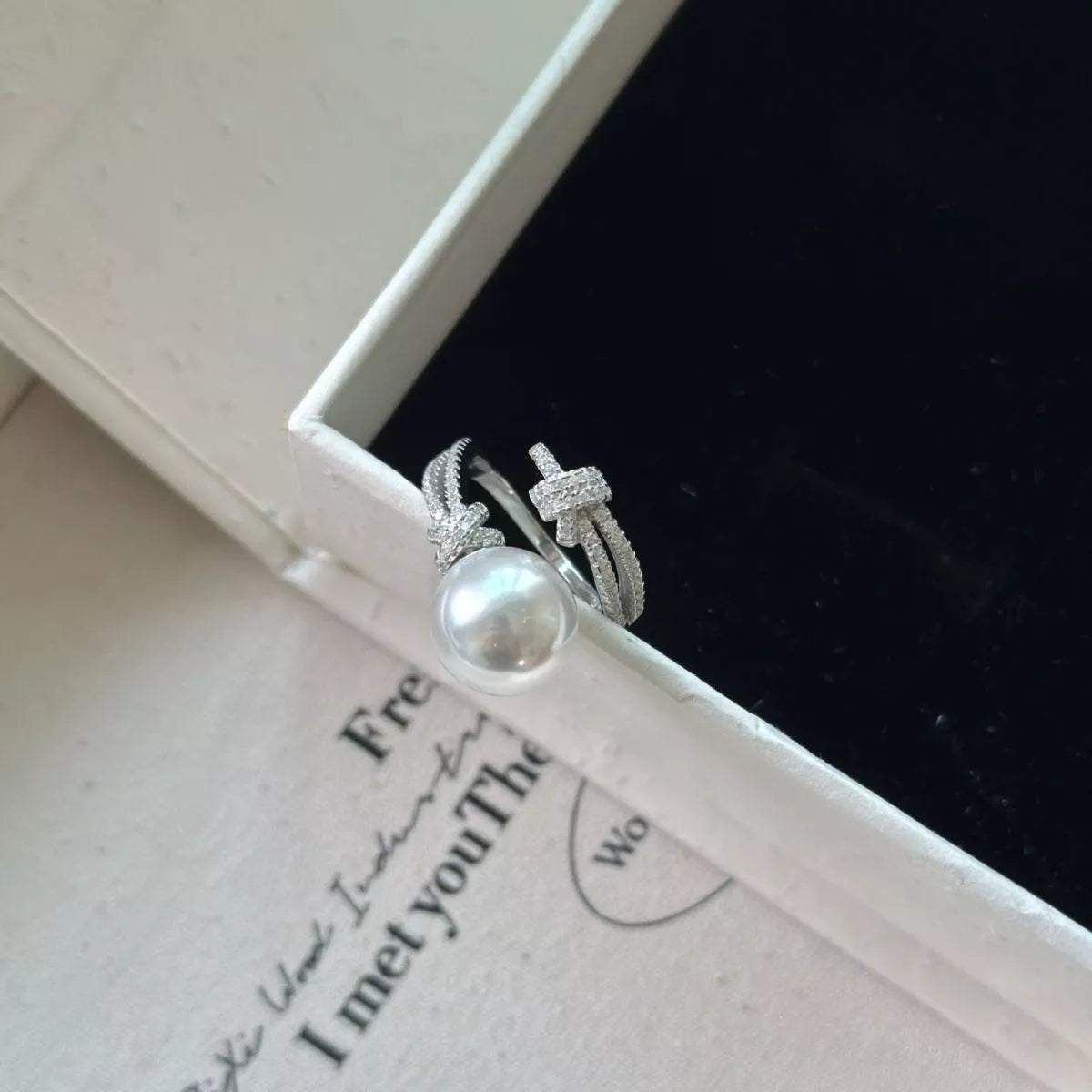 pearl and zircon bypass ring in sterling silver back view