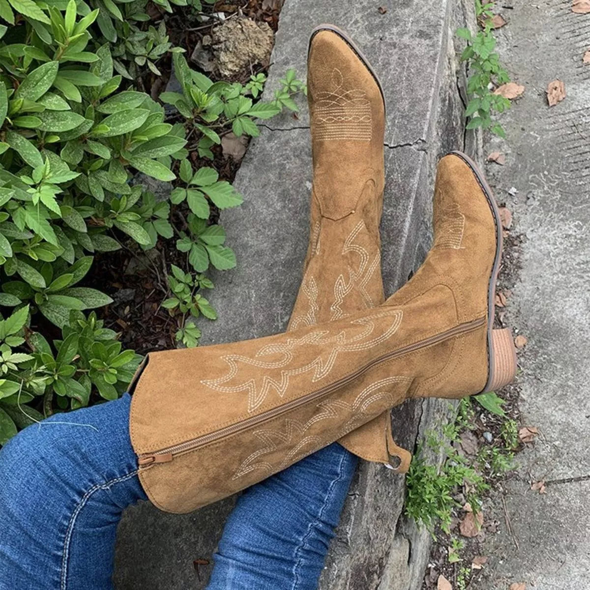 Point toe block heel suede boots pair view
