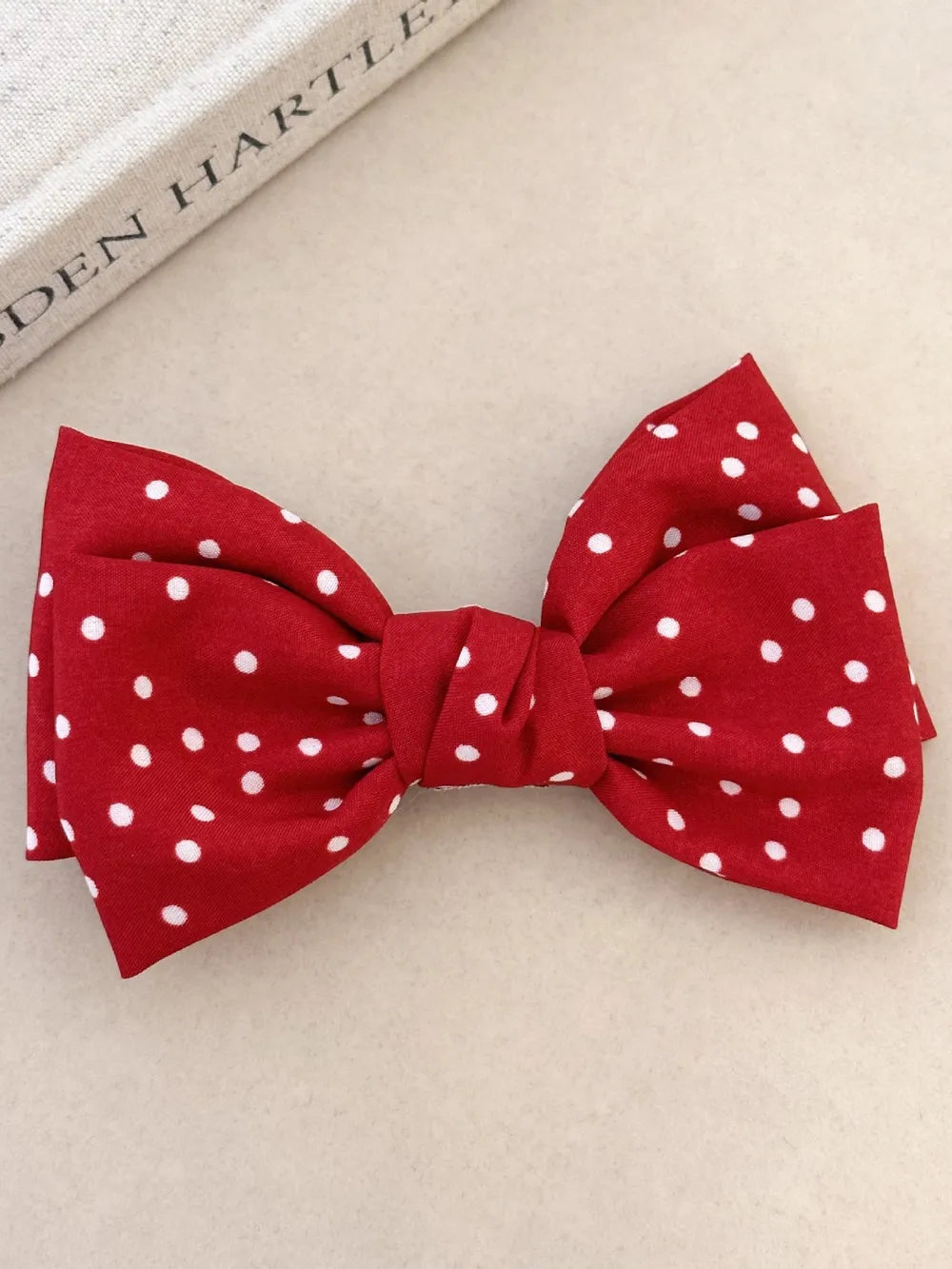 Deep red polka dot bow hair clip long bow detail
