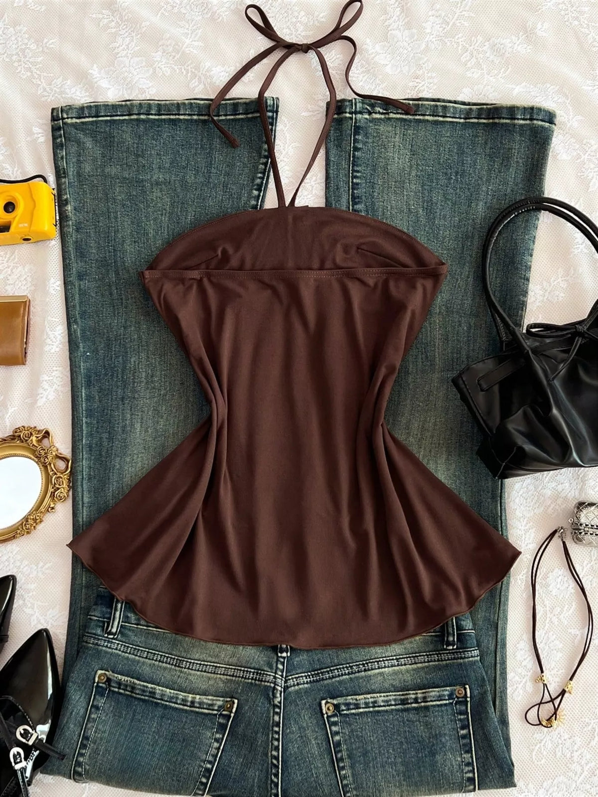 Neckline detail on the embellished halter cami