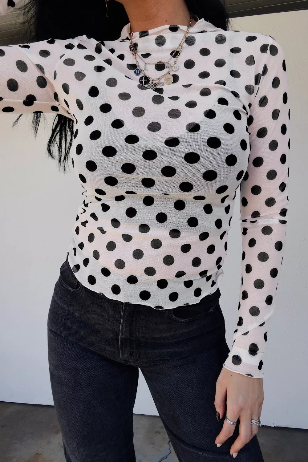 White polka dot sheer mesh long sleeve top back view