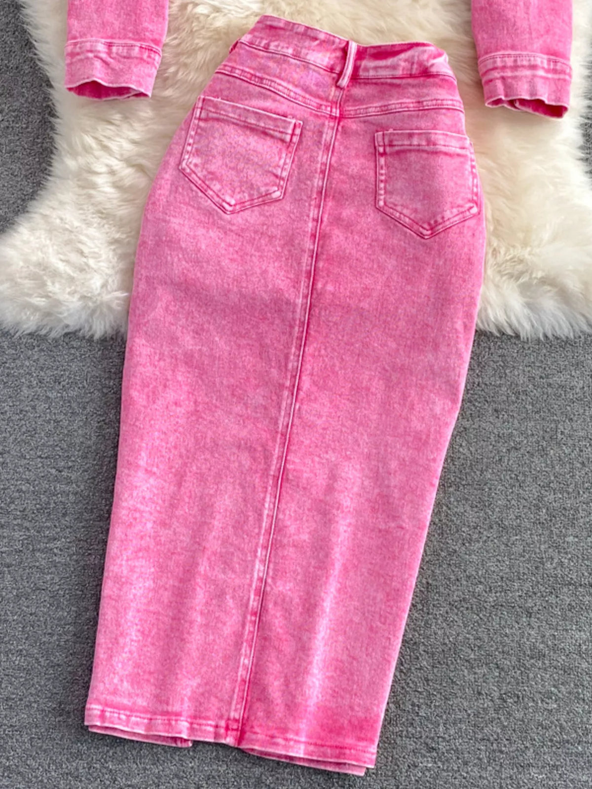 Pink denim skirt slit detail
