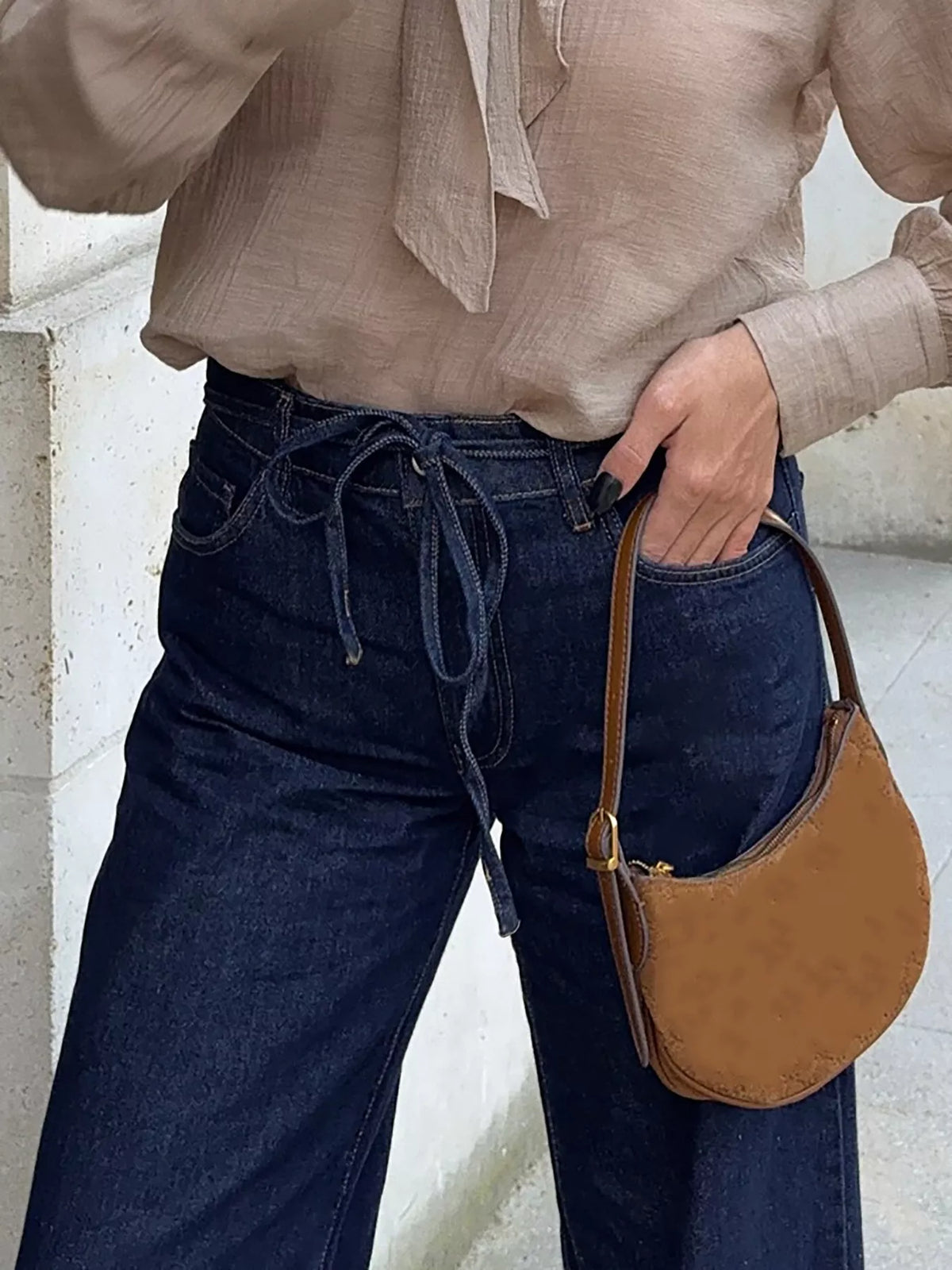Tie waist detail on flare jeans