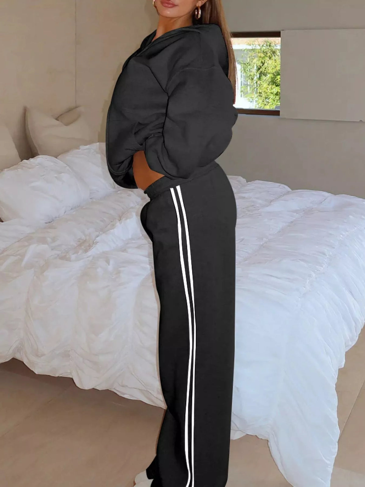 Casual hoodie and striped pants set detail