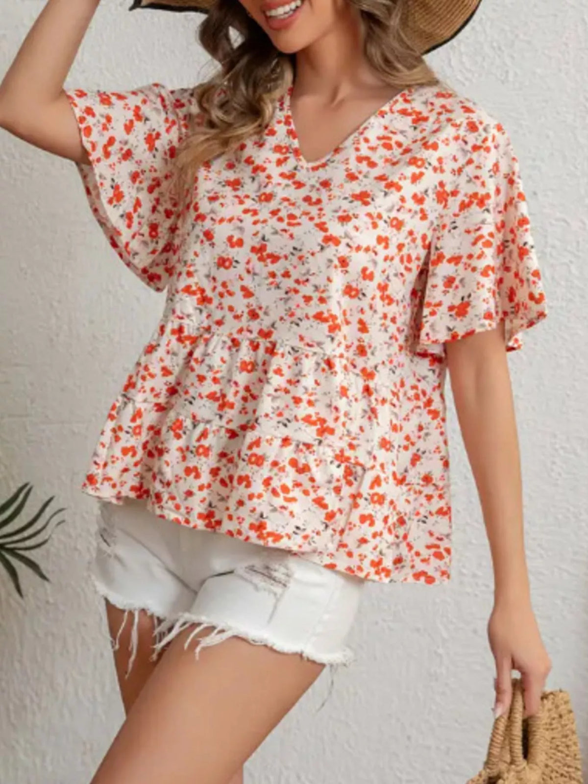 Floral print V neck ruffle sleeve peplum blouse front view