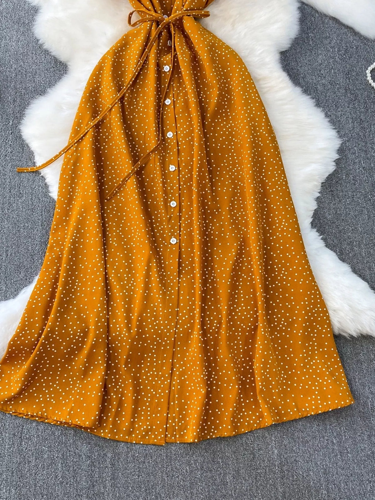 Dark yellow polka dot button up maxi dress side view