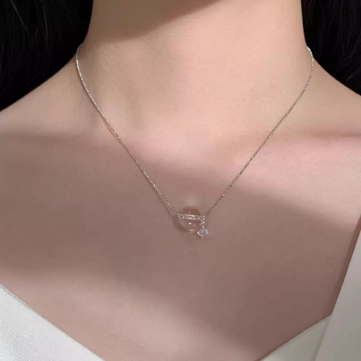 Sterling silver crystal pendant necklace side view