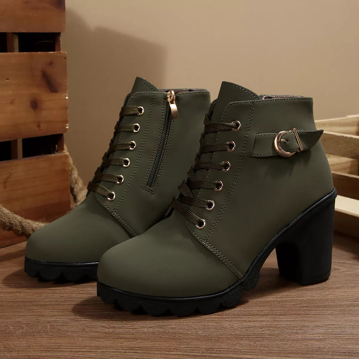 Lace up block heel suede boots paired with denim