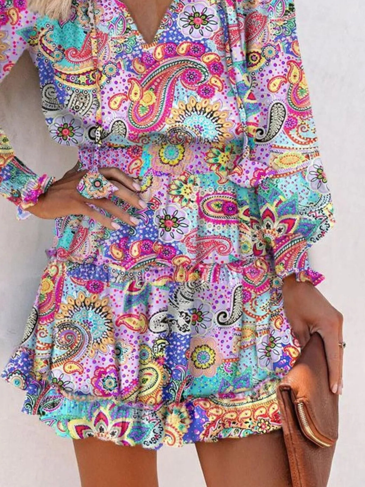 Tie neck lantern sleeve tiered dress front view