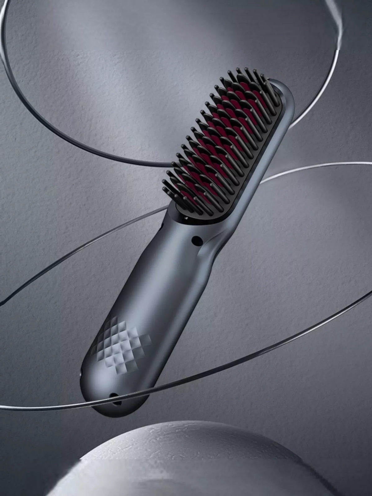 Woman smoothing hair with comb