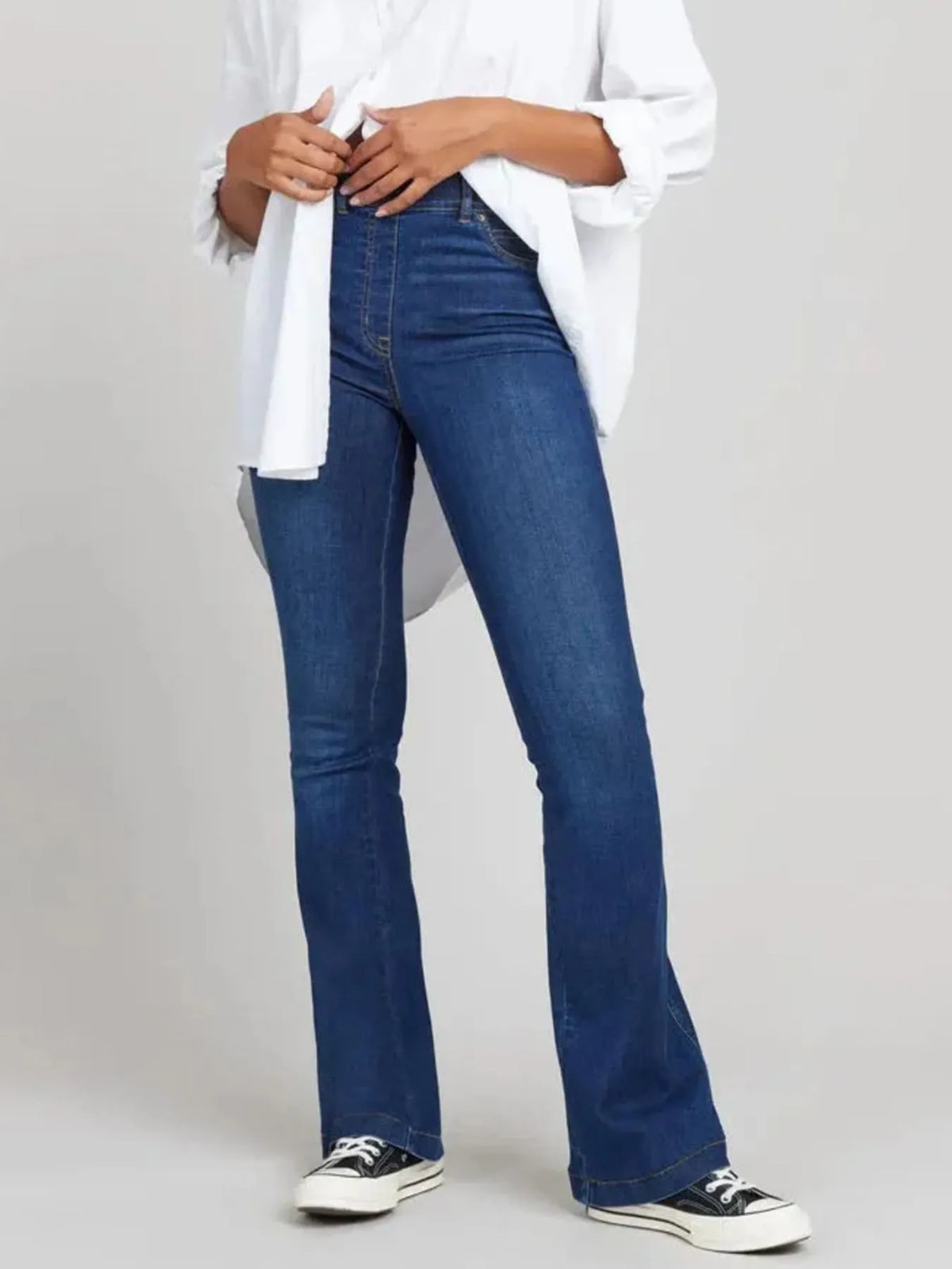 Flare jeans showing dramatic leg sweep