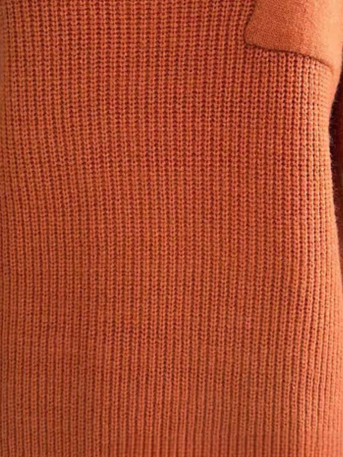pocket detail dropped shoulder ribbed sweater folded flat