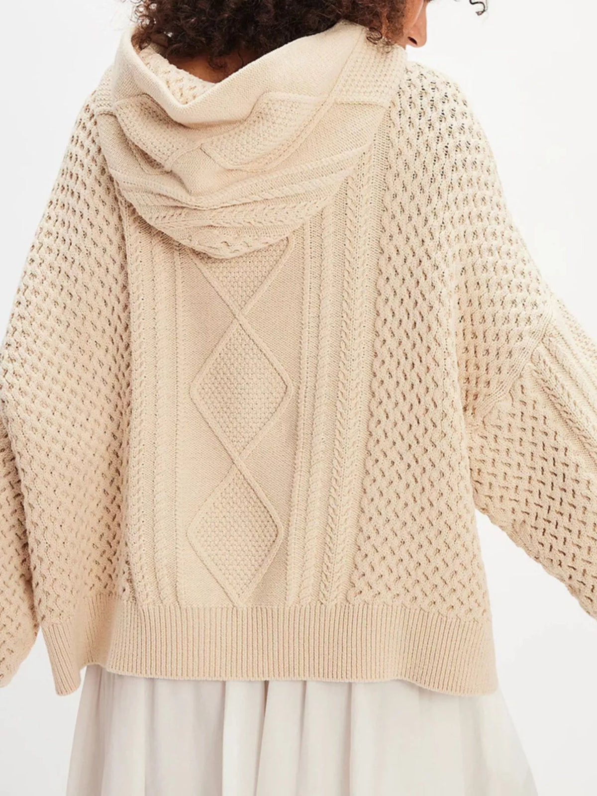 Back view of the cable knit hooded sweater