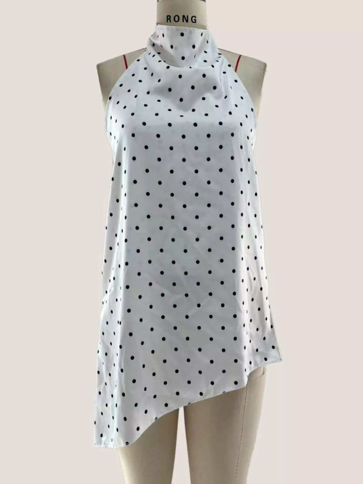 Polka dot halter top shown in a white colourway