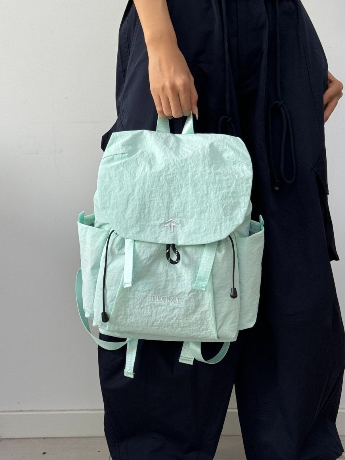 Green backpack side profile