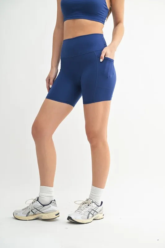 mono b cloud sculpt biker shorts in blue depth back view