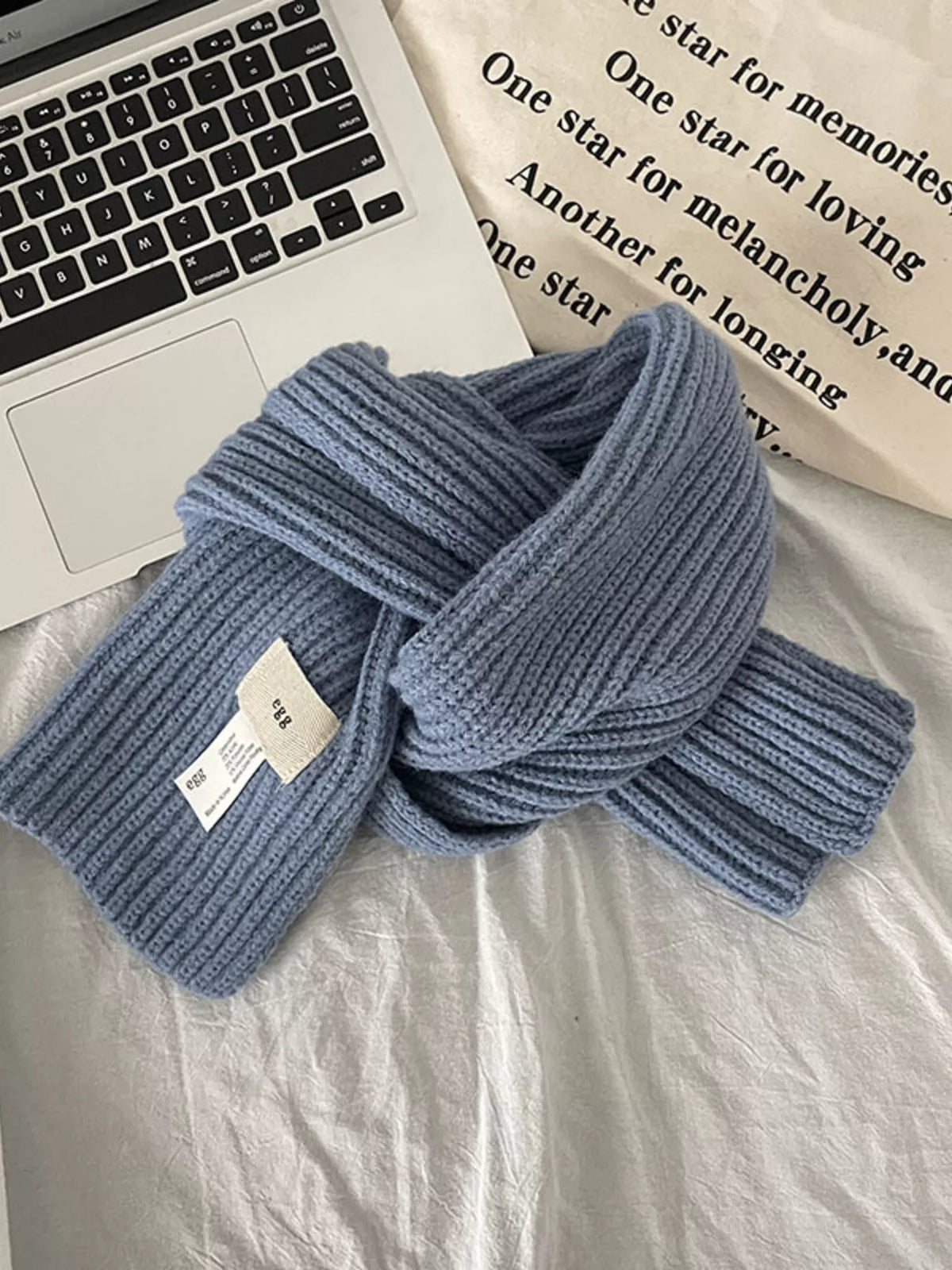 Haze blue ribbed scarf shown in full length