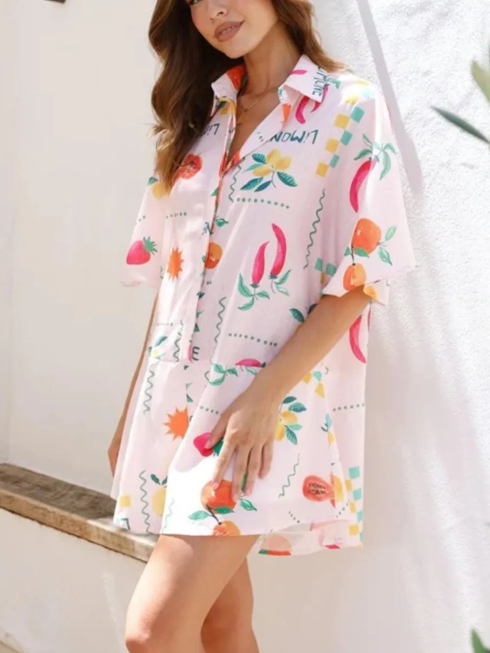 Printed romper in blush pink back view