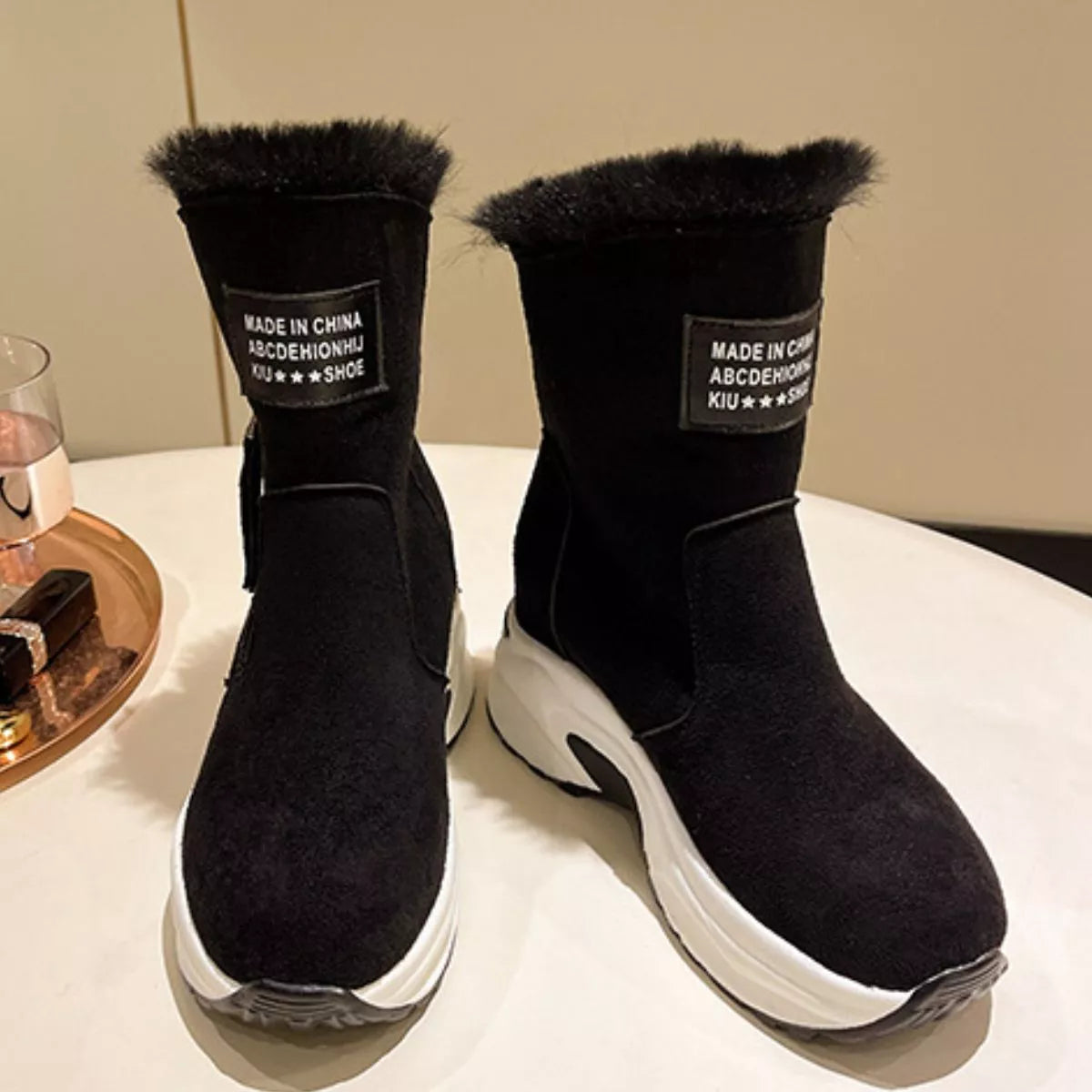 Side zipper platform boots heel and sole detail