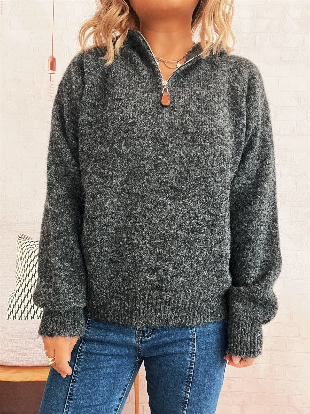 Ribbed hem sweater styled with jeans