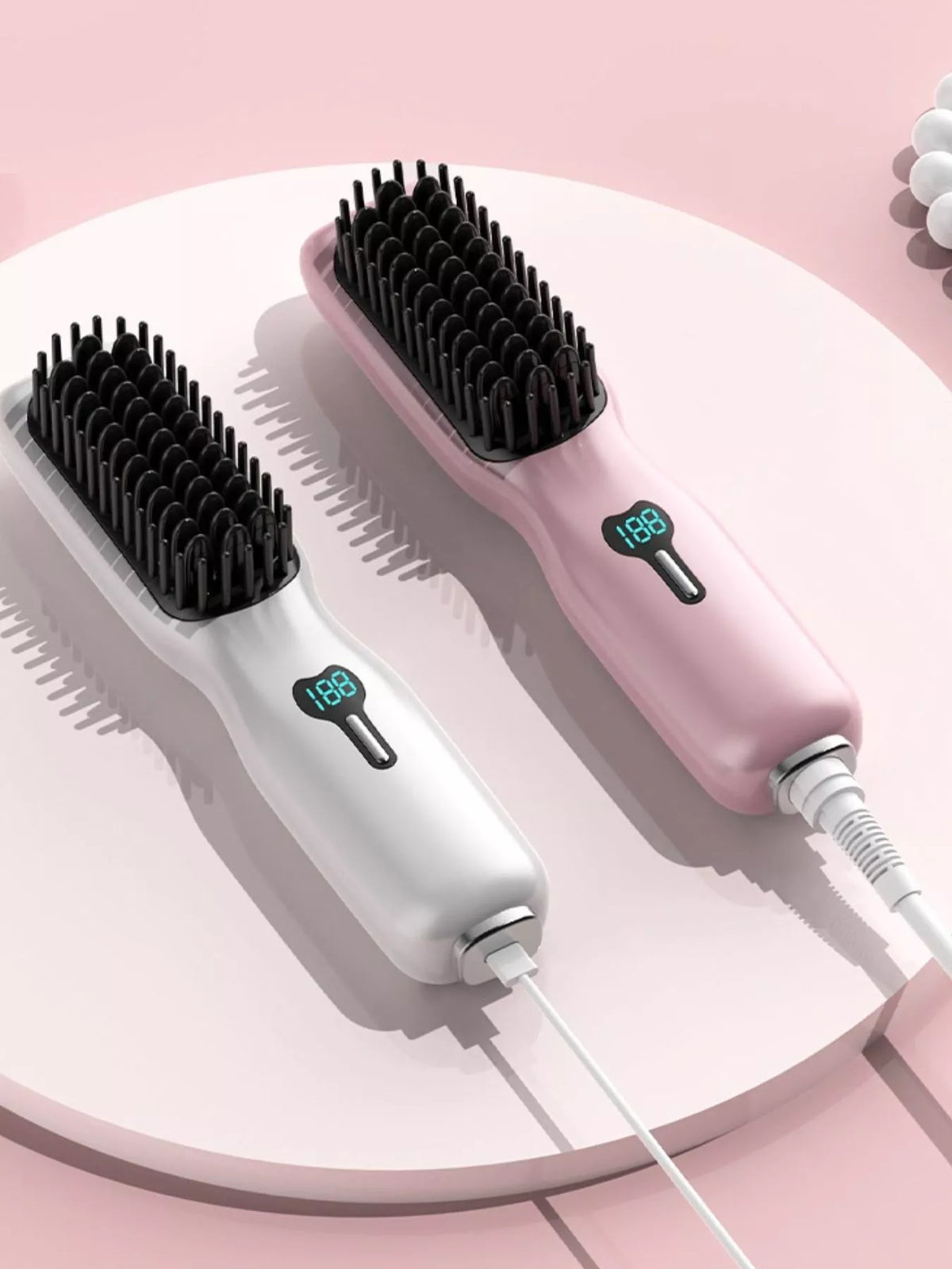 Straightening comb smoothing through hair