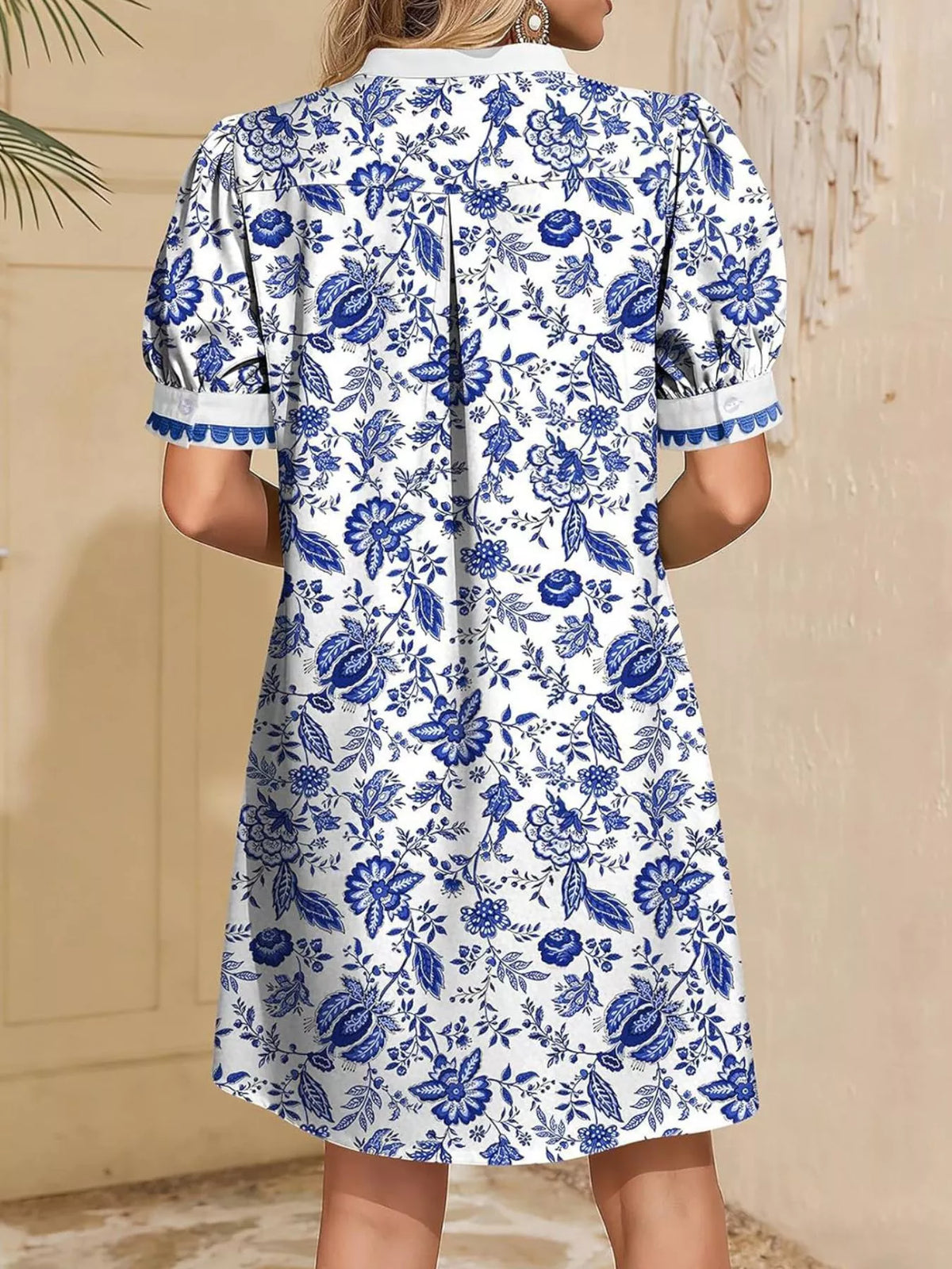 Notched mini dress shown in a deeper colorway