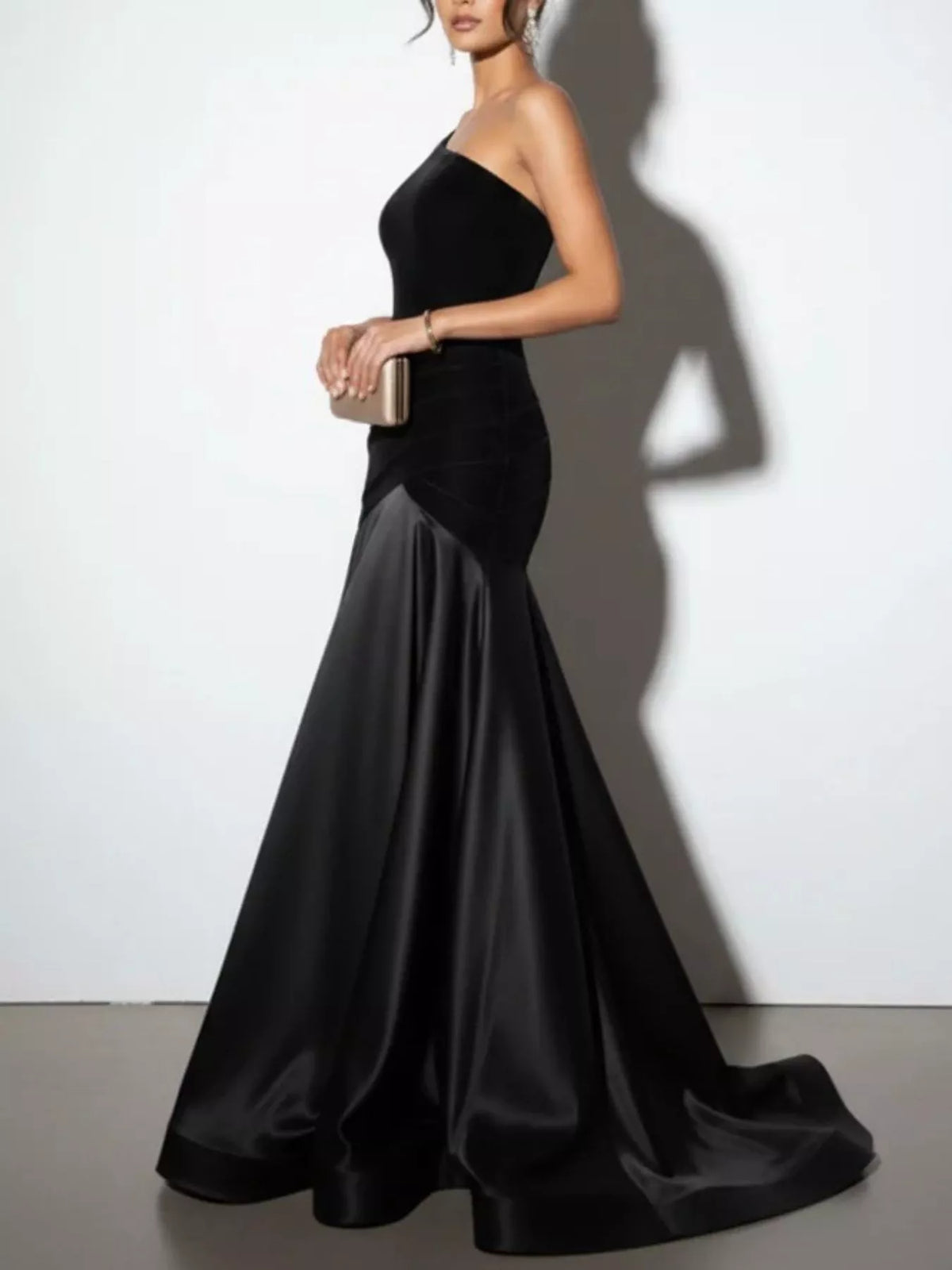 Green single shoulder formal gown on model