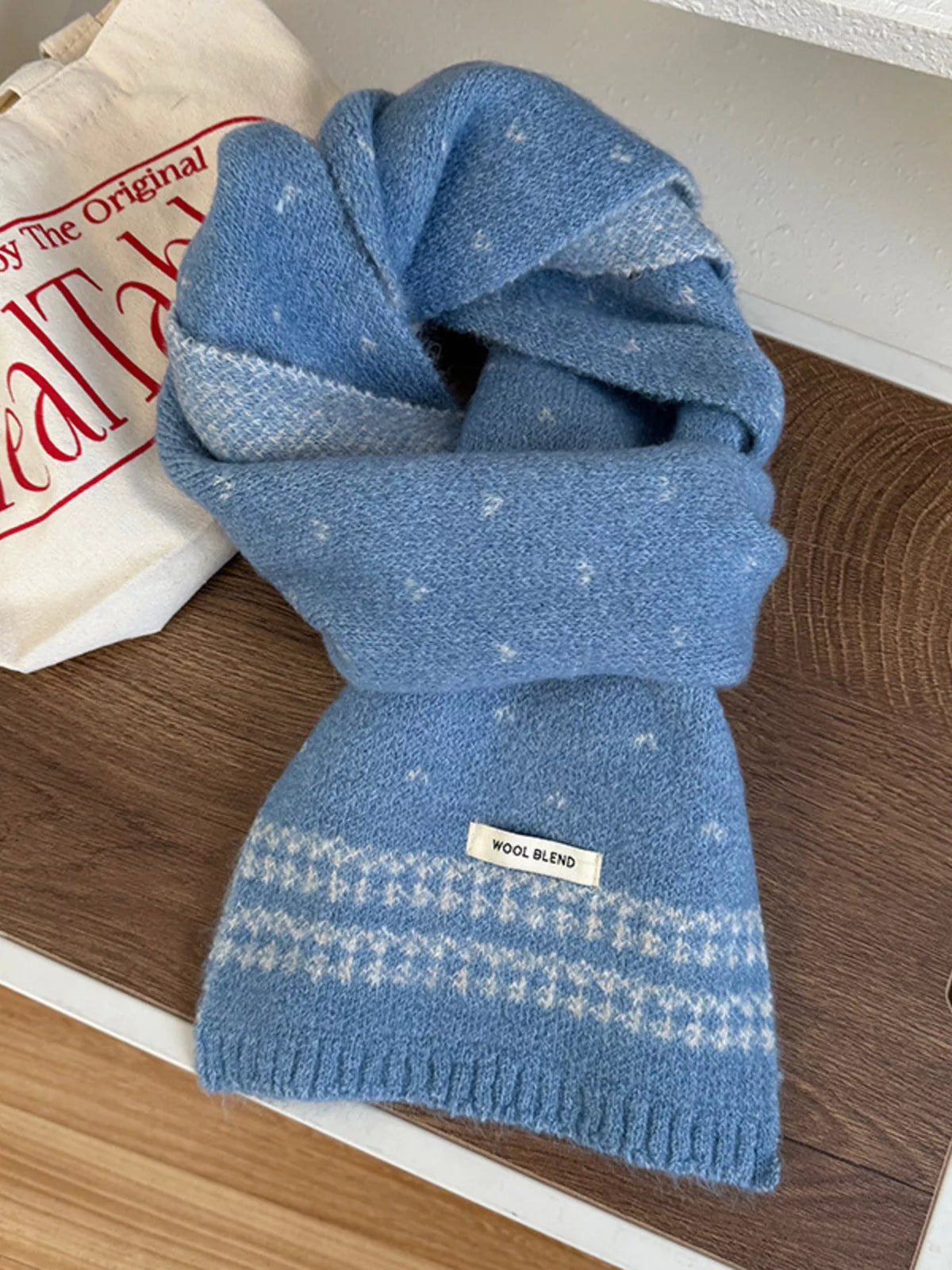 Winter knitted scarf shown in a neutral color option