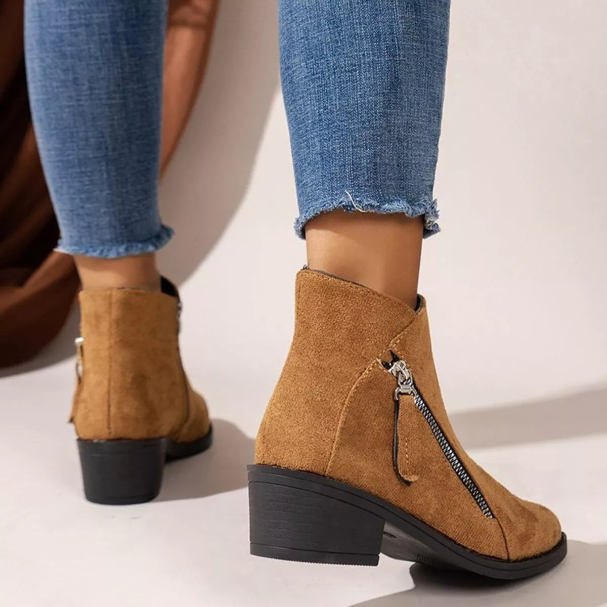 Leopard point toe block heels boots worn on model