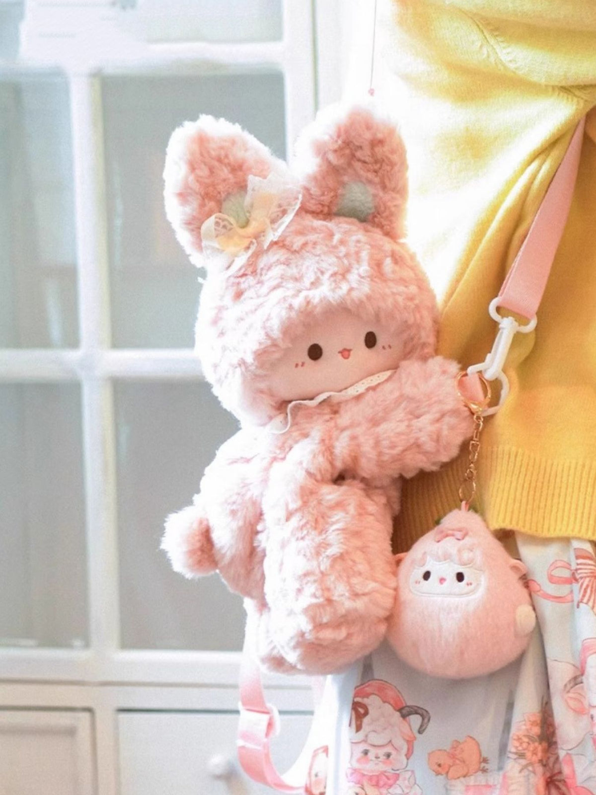 Blush pink plush bunny backpack back and straps