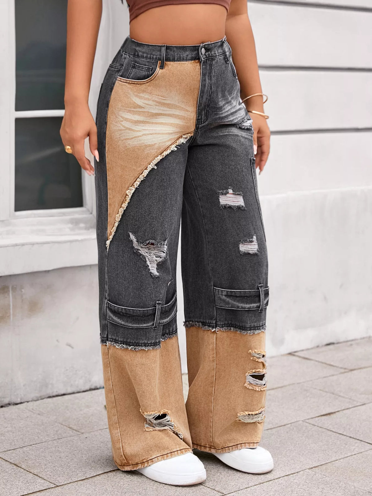 Two tone contrast detail on black wide leg denim