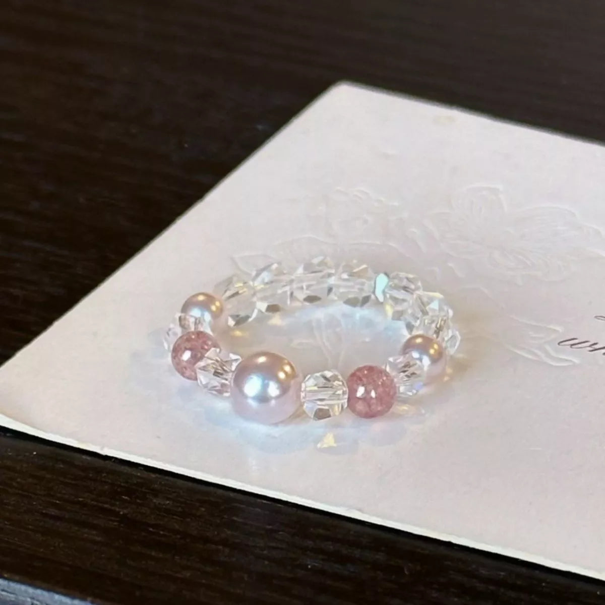 Pearl and crystal bead ring close up