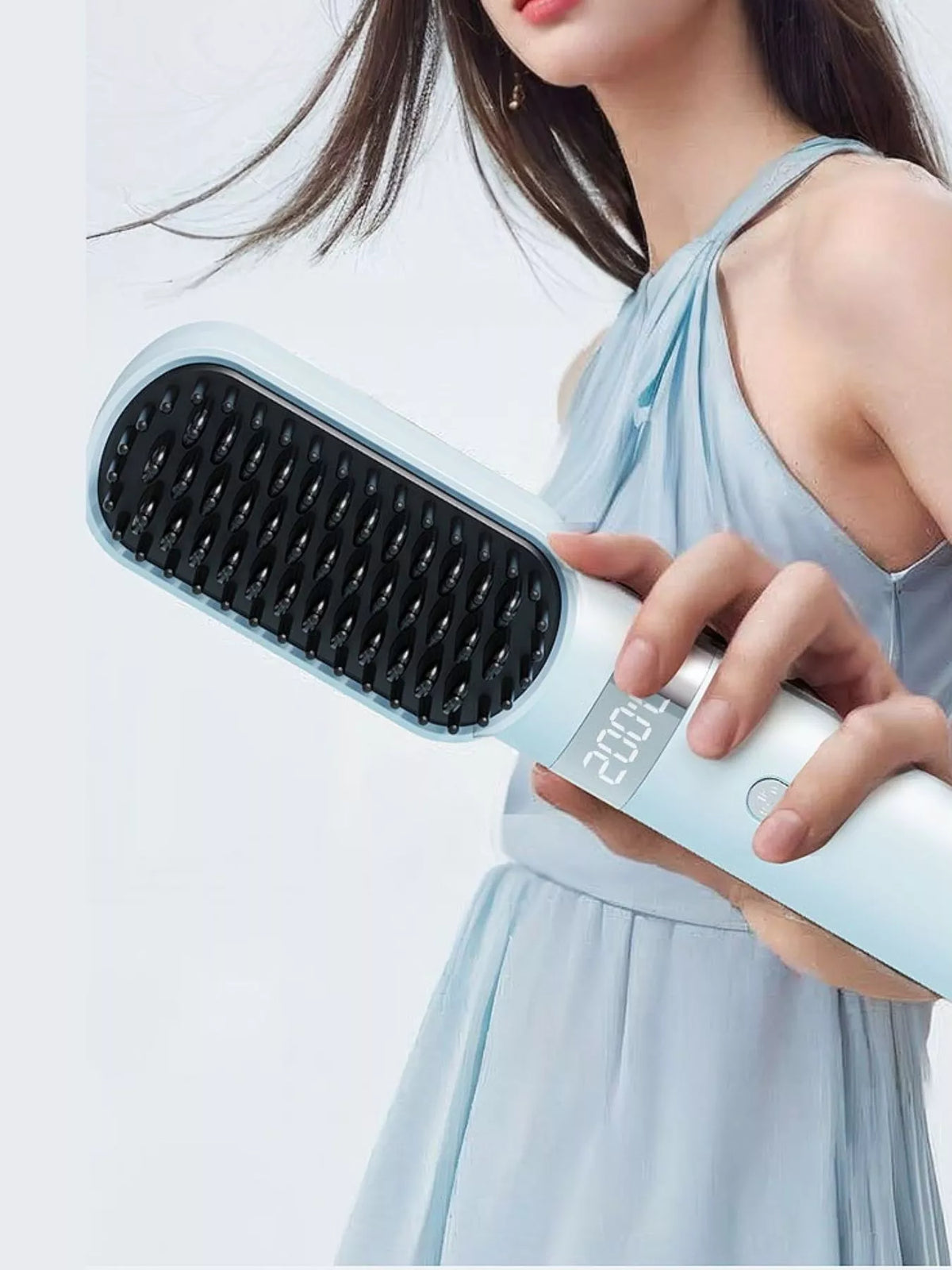 Straightening comb heated bristles