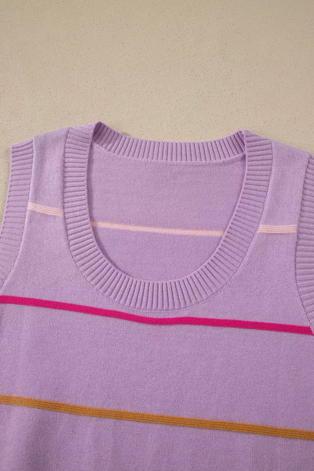 Striped sweater tank top hem detail