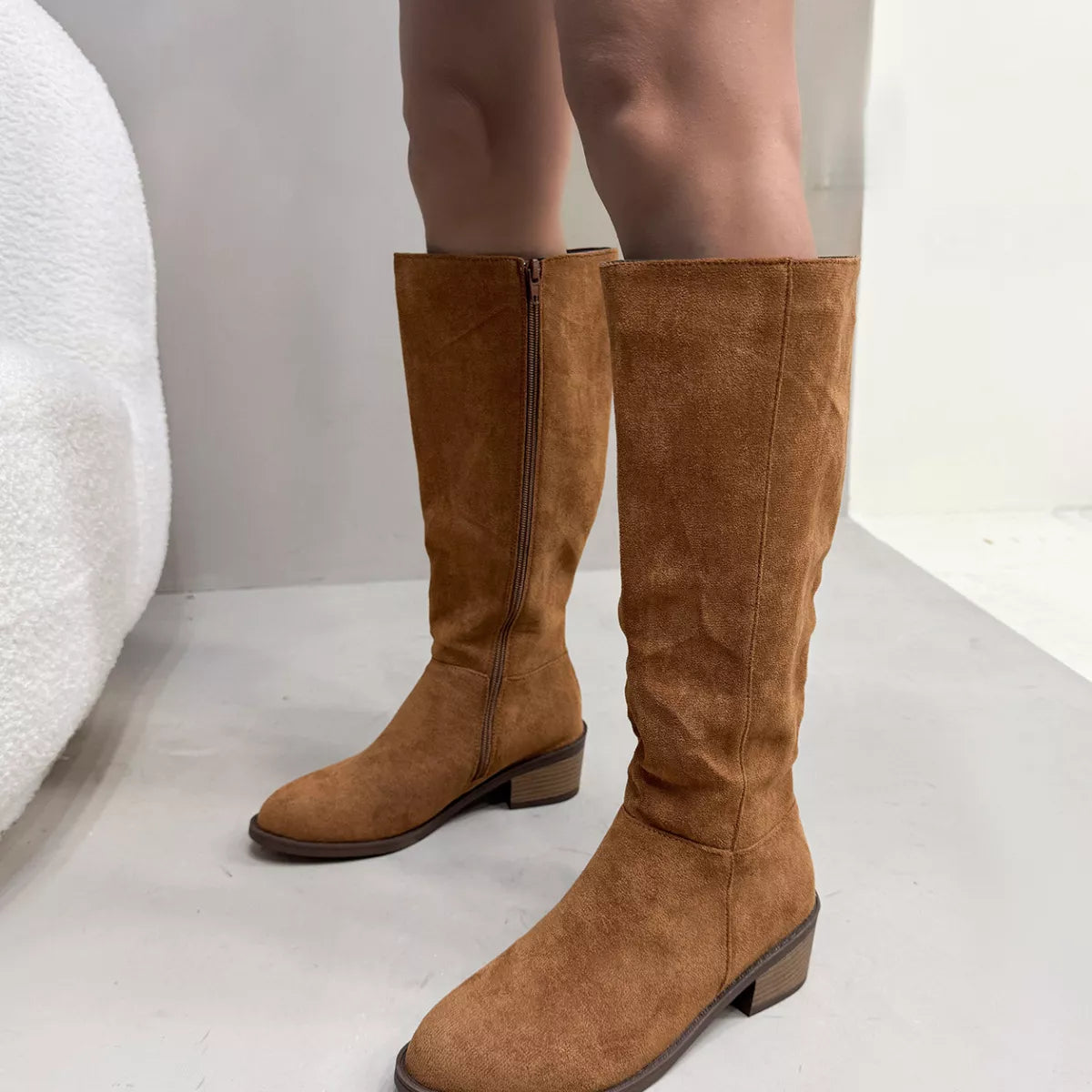 Brown round toe block heels boots top down view