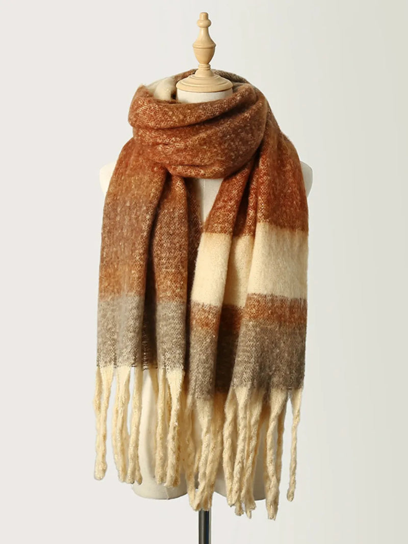 Fringe color block scarf draped over a coat
