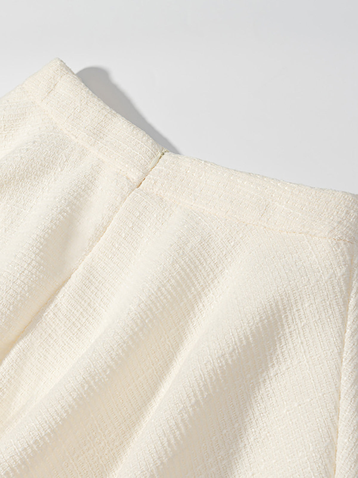 Cream set back styling