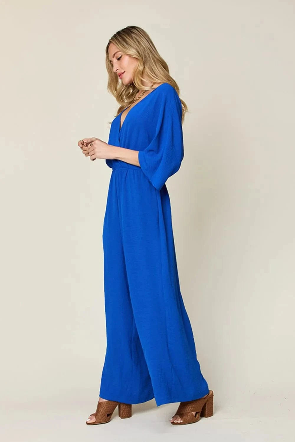 Double Take (Oh) Dresses Double Take Full Size Surplice Wide Leg Jumpsuit with Pockets
