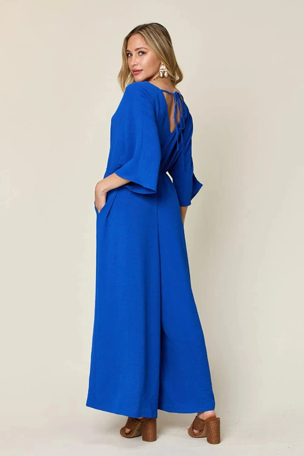 Double Take (Oh) Dresses Double Take Full Size Surplice Wide Leg Jumpsuit with Pockets