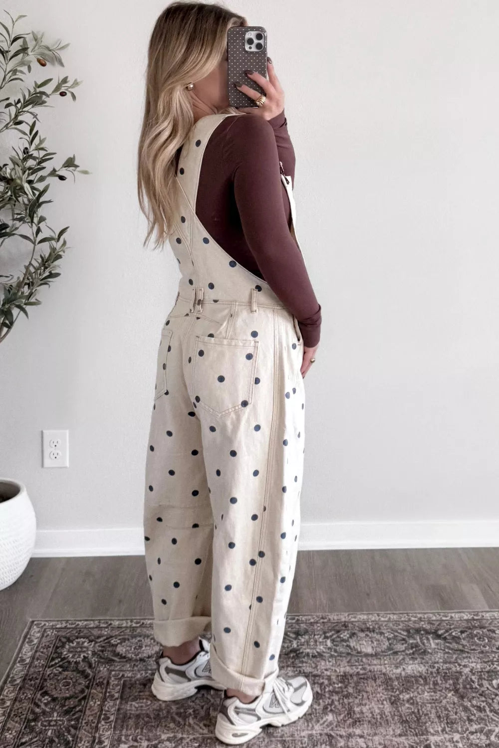Denim jumpsuit pocket detail