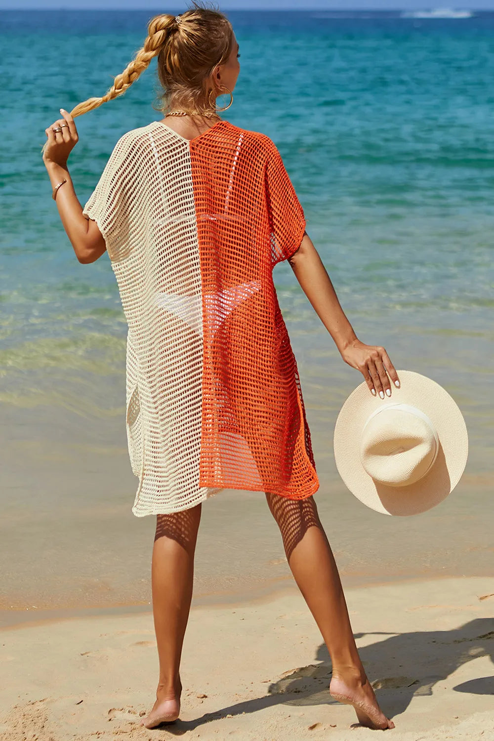 Openwork cover up styled over swimwear full length