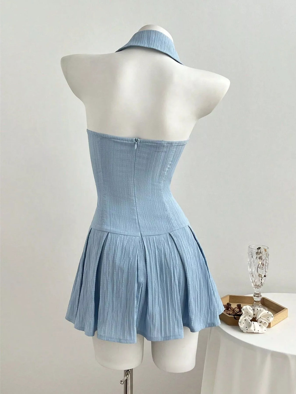 Light blue pleated mini dress back view