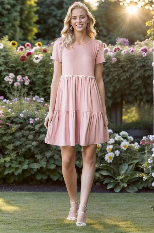 Dusty rose tiered mini dress with pompom lace front view