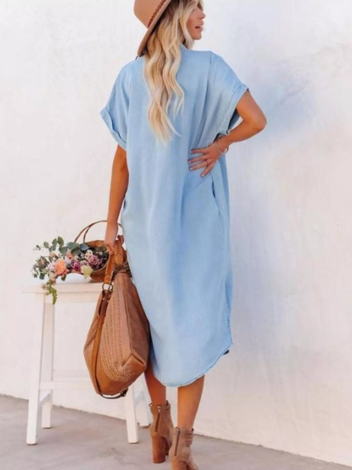 Light blue button front collared shirt dress with side slits front view