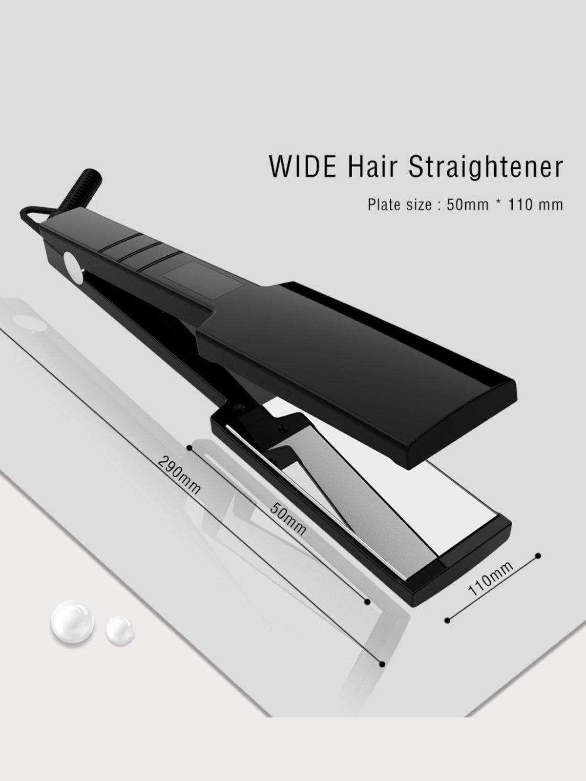 Straightener smoothing a section of hair